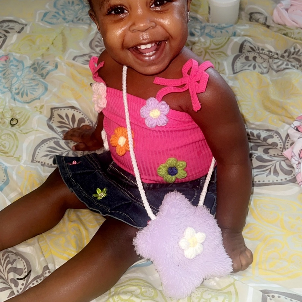 6-9 runs big, my baby is 15 months and she can fit it.